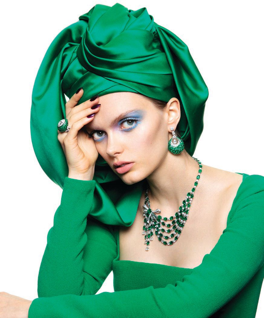 Lela Rose wool crepe A-line dress, Neiman Marcus, in the Galleria; Eric Javits Sheikha headpiece,Saks Fifth Avenue, in the Galleria; Graff Bombé earrings with emeralds and diamonds, Pavilion ring with emeralds and diamonds, and Bow necklace with emeralds and diamonds, Saks Fifth Avenue, in the Galleria.  LELA ROSE PHOTO BY MICHAEL FILONOW
