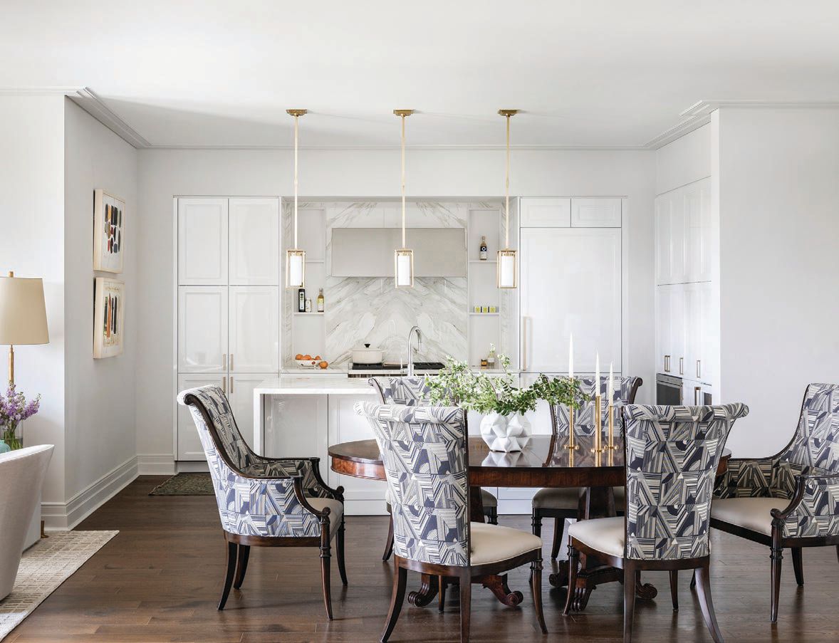 Utilizing the homeowners’ existing table and chairs, Dodson added a fresh spin by reupholstering the chairs in Lelièvre fabric from The Joseph Company PHOTOGRAPHED BY JULIE SOEFER