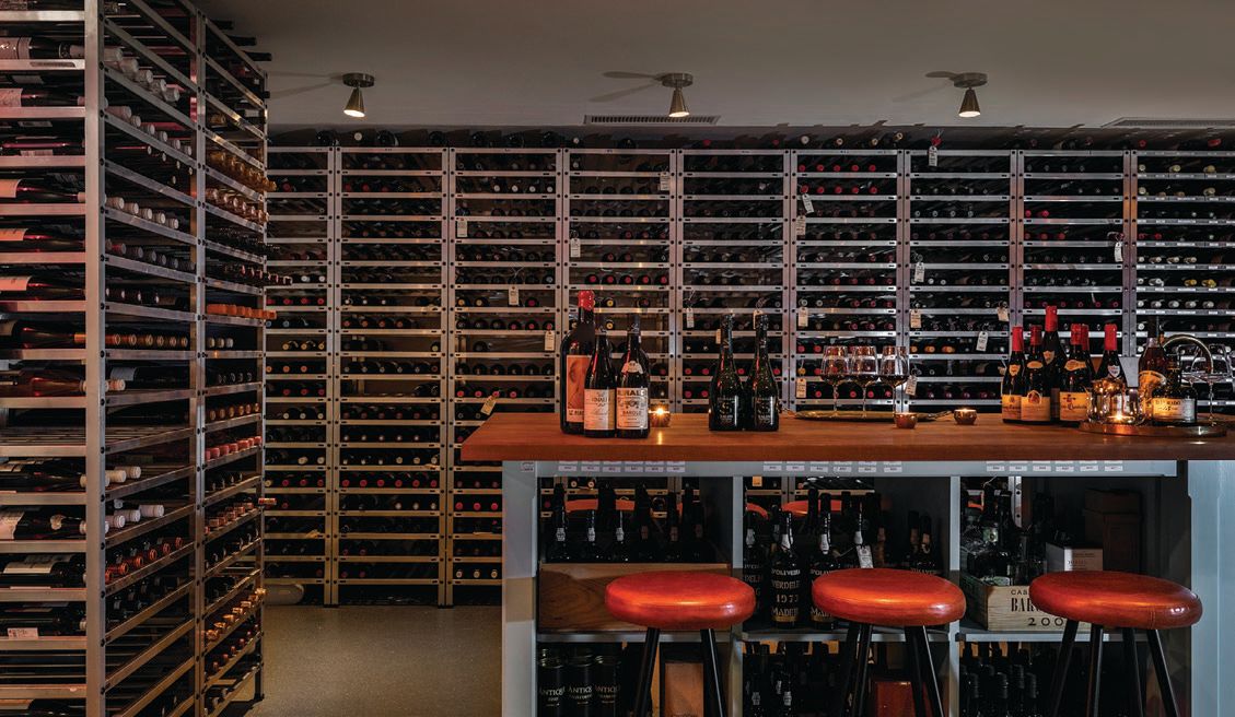 The wine cellar houses 11,000 bottles of vino PHOTO BY JULIE SOEFER